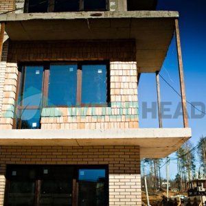 Коттеджный поселок Черничная Поляна - монтаж фасада из дранки